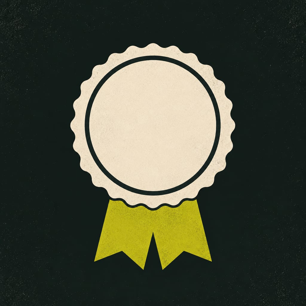 A blank circular seal with a scalloped edge and a ribbon tail.